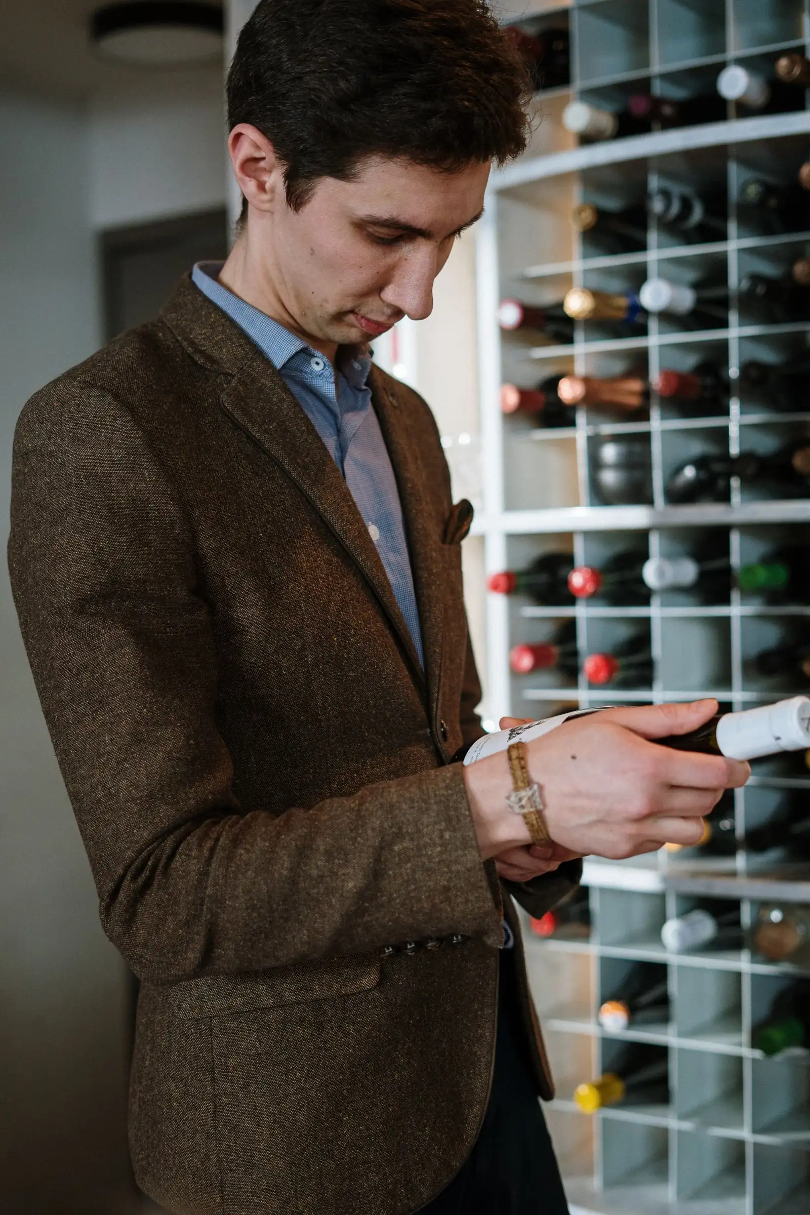 Buyer examining a bottle
